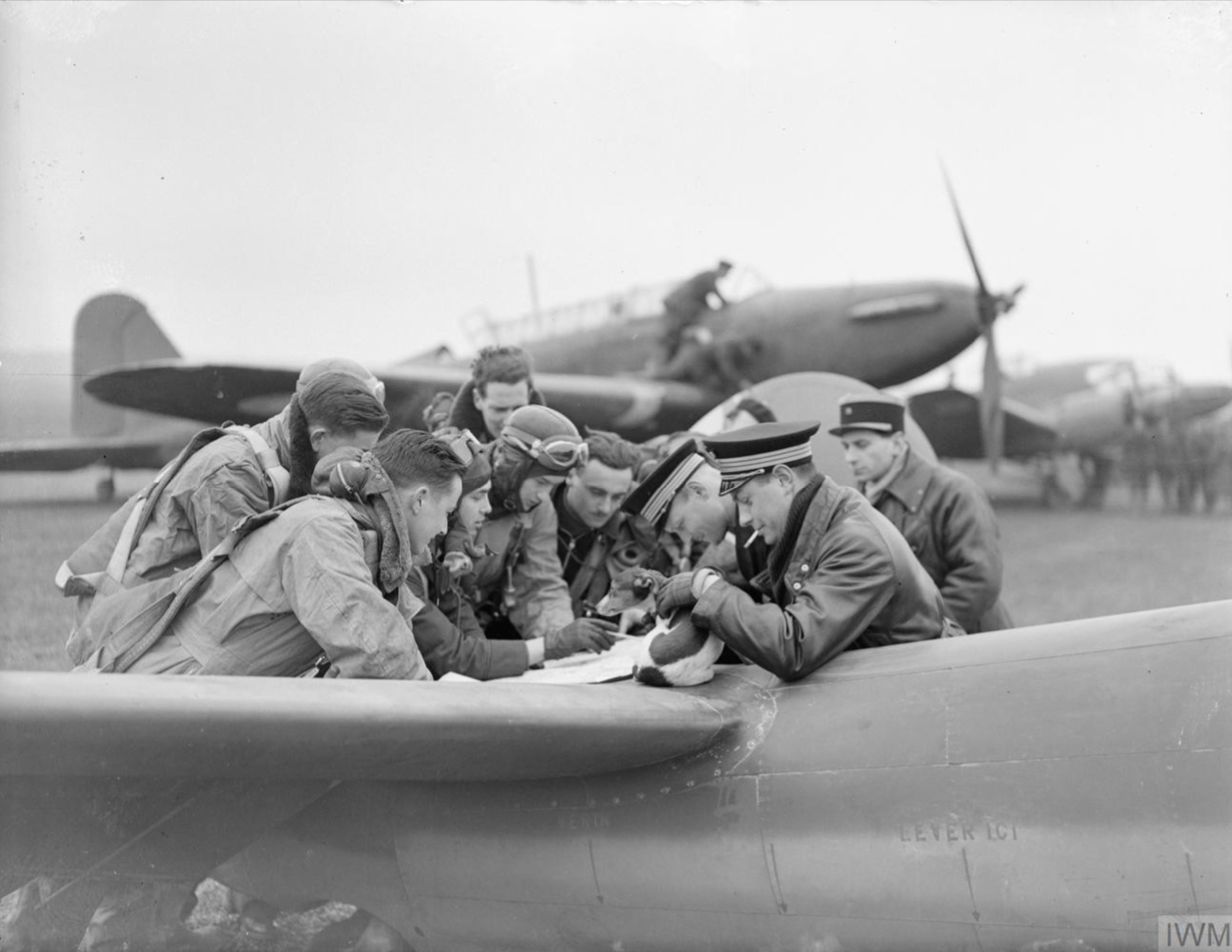 RAF Fairey Battle crews working with French Officers on the target area IWM C689