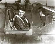 Asisbiz Aircrew USAAF 23FG unknown pilot in his cockpit 01