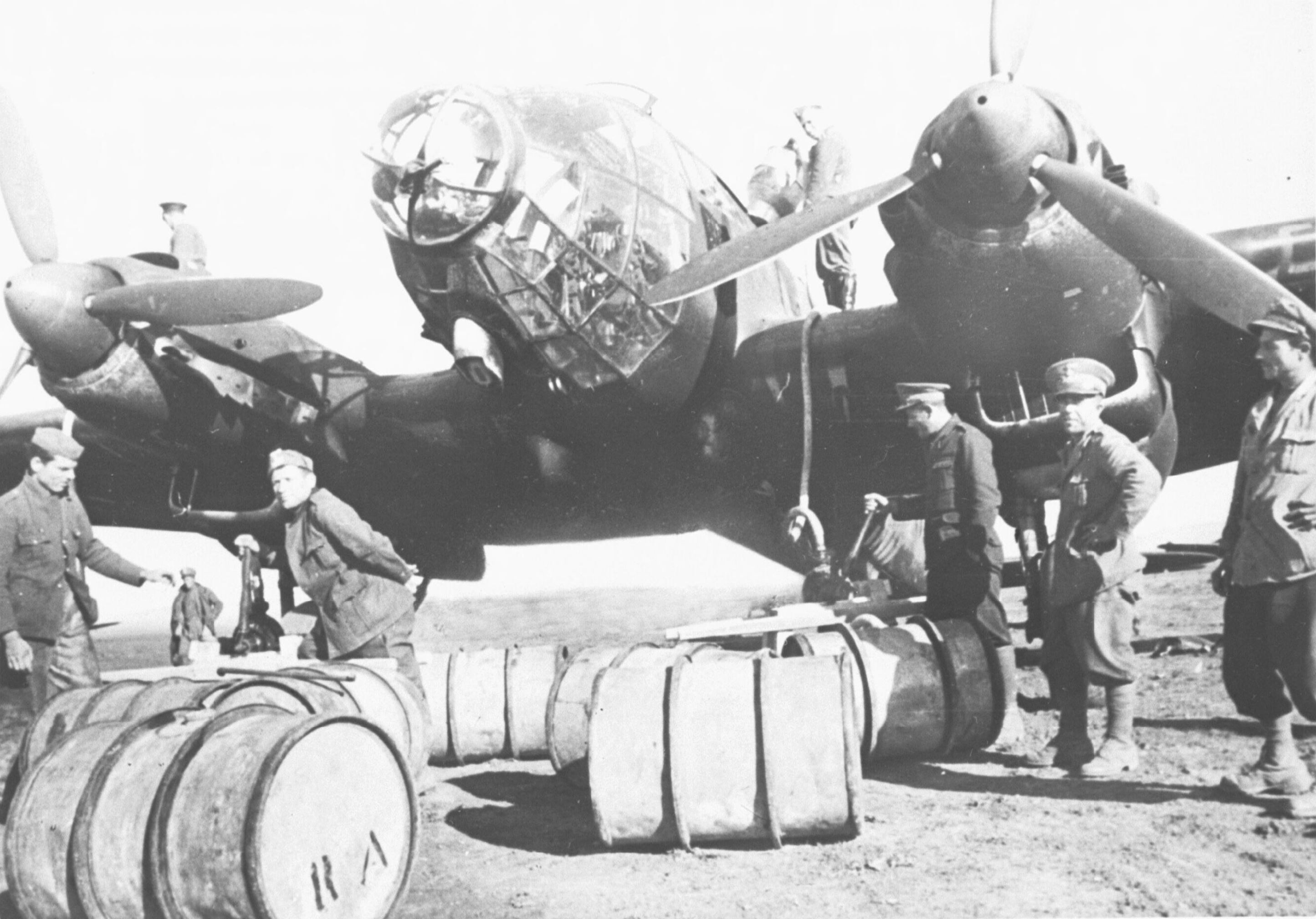 Heinkel He 111 being refueled in Italy transit flight 7th Mar 1941 NIOD