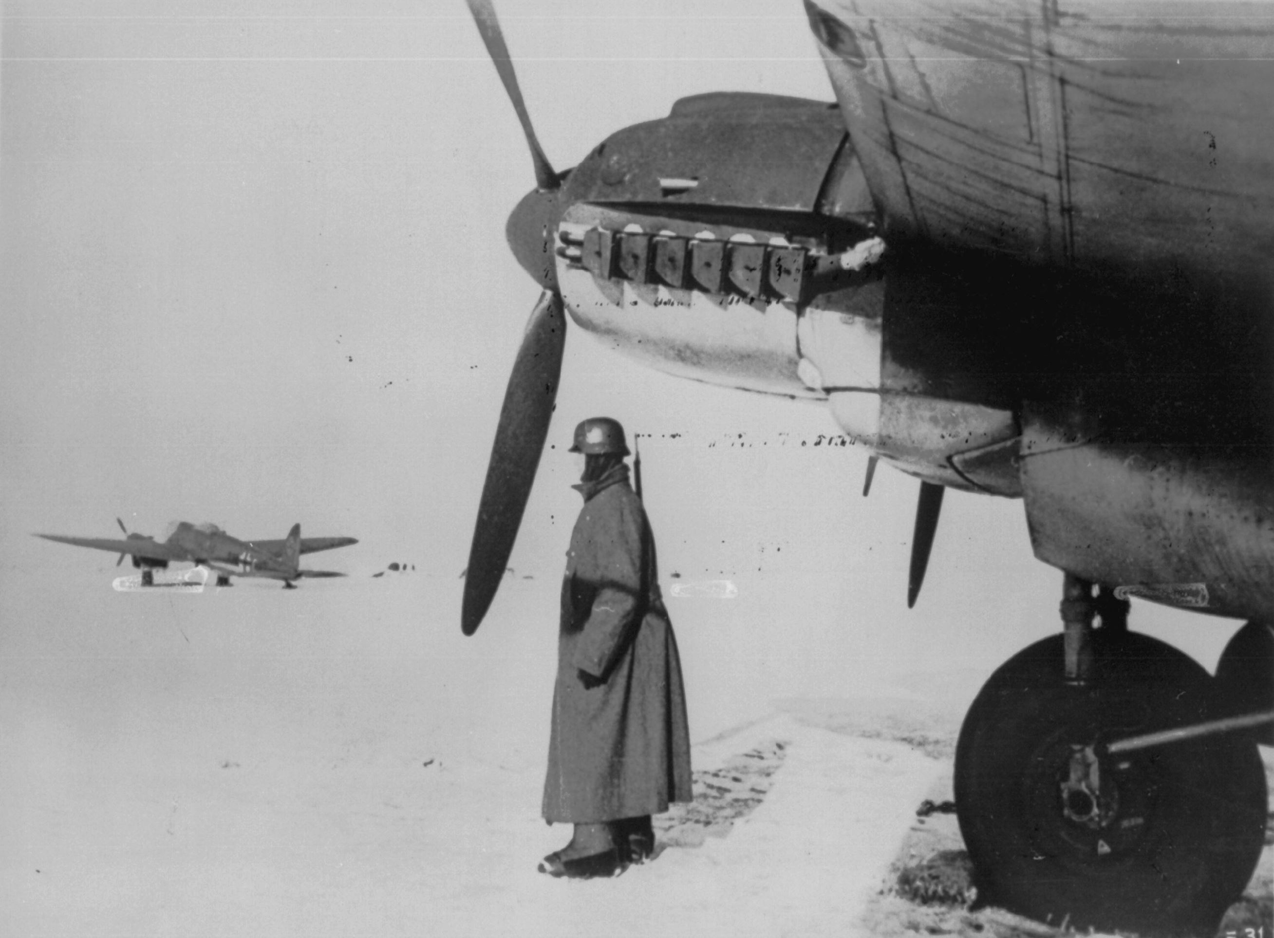 Ostfront Heinkel He 111H being guarded eastern front NIOD