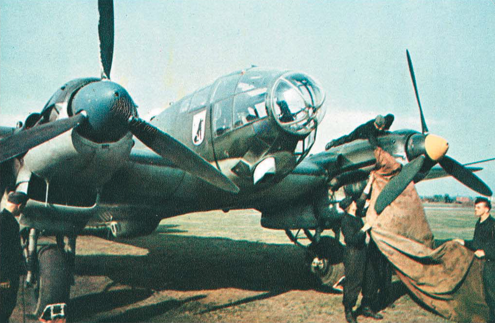 Heinkel He 111H KG26 ground crew covering the engines 02