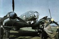 Asisbiz Heinkel He 111H KG26 ground crew covering the engines 01