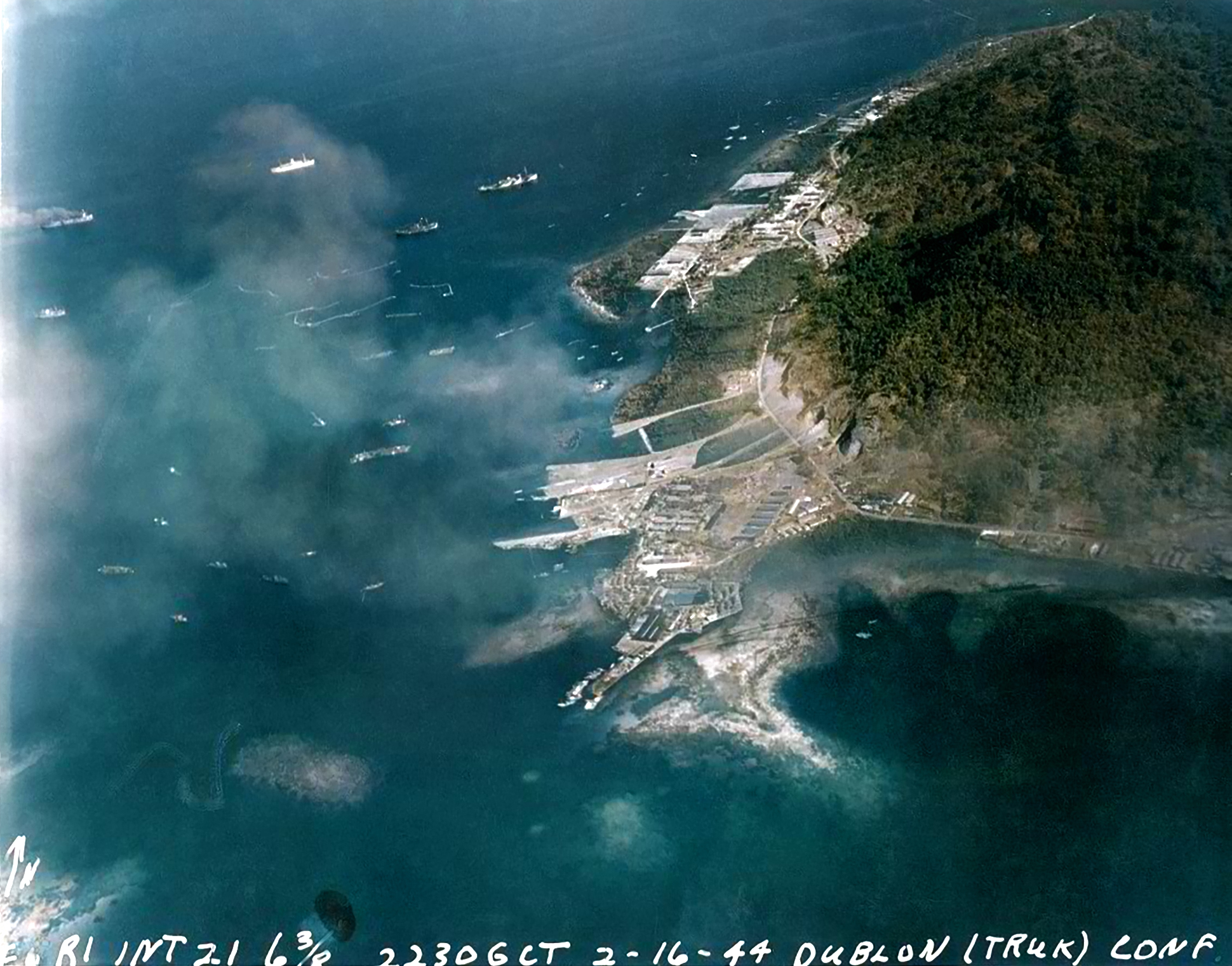 Strike photograph of raid against Truk by aircraft off CV 11 USS Intrepid 01