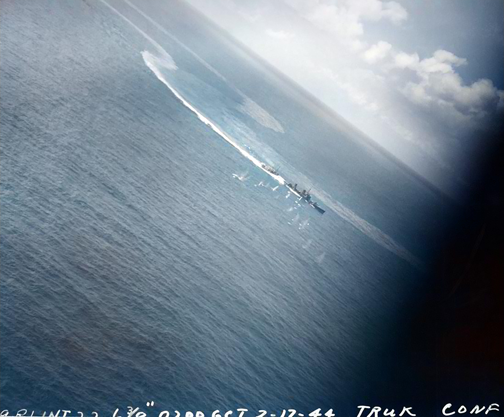 Strike photograph of raid against Truk by aircraft off CV 11 USS Intrepid 03