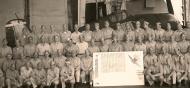 Asisbiz CAG 15 Hellcat BuNo 70143 Dave McCampbell the navy's top ace (seated to the right of the sign) aircraft was lost in Dec 1944 01