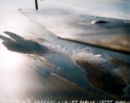Asisbiz Truk Atoll under attack aerial view from Moen 1944 01