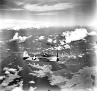 Asisbiz Grumman F6F 3 Hellcat White 315 over Lake Sentani Hollandia CVE 26 USS Sangamon 01