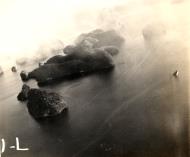Asisbiz Target photos taken by VF 1 showing a sinking Japanese ship Palau Mar 30th 1944 01