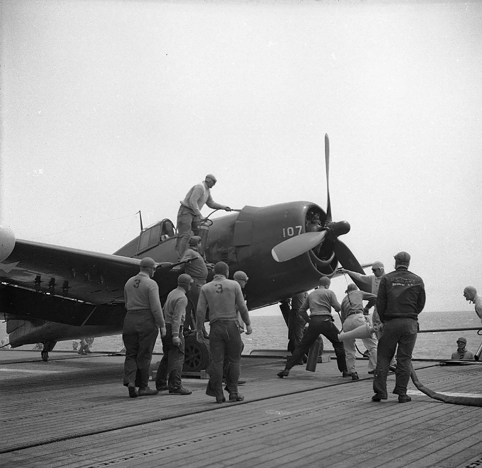 Grumman F6F 5N Hellcat White 107 being prepared for take off 01