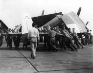 Asisbiz Grumman F6F 5 Hellcat VF 40 White D3 preparing for launch CVE 27 USS Suwanee Aug 1945 01