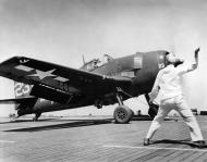 Asisbiz Grumman F6F 5 Hellcat White 23 preparing to launch 01