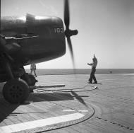 Asisbiz Grumman F6F 5N Hellcat White 103 being prepared for take off 01