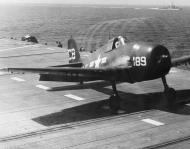 Asisbiz Grumman F6F CQTU 4 Carrier Qualification Training Unit at NAAS Corry Field on the flight deck of the USS Monterey