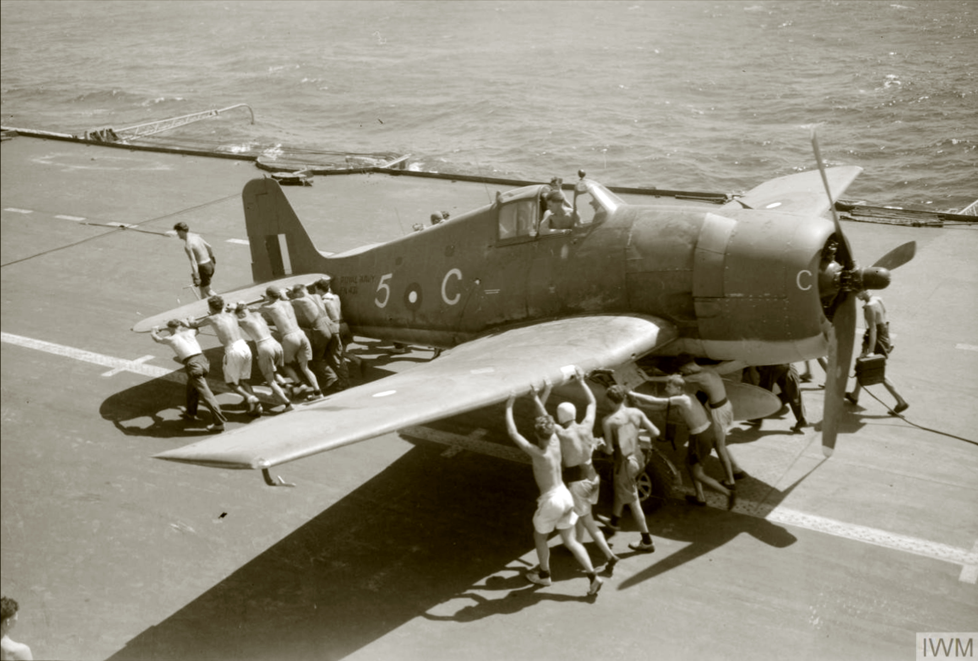 HMS Indomitable launches Hellcat FAA 1839NAS 5C FN431 for a raid on Padang Sumatra Aug 1944 IWM A25581