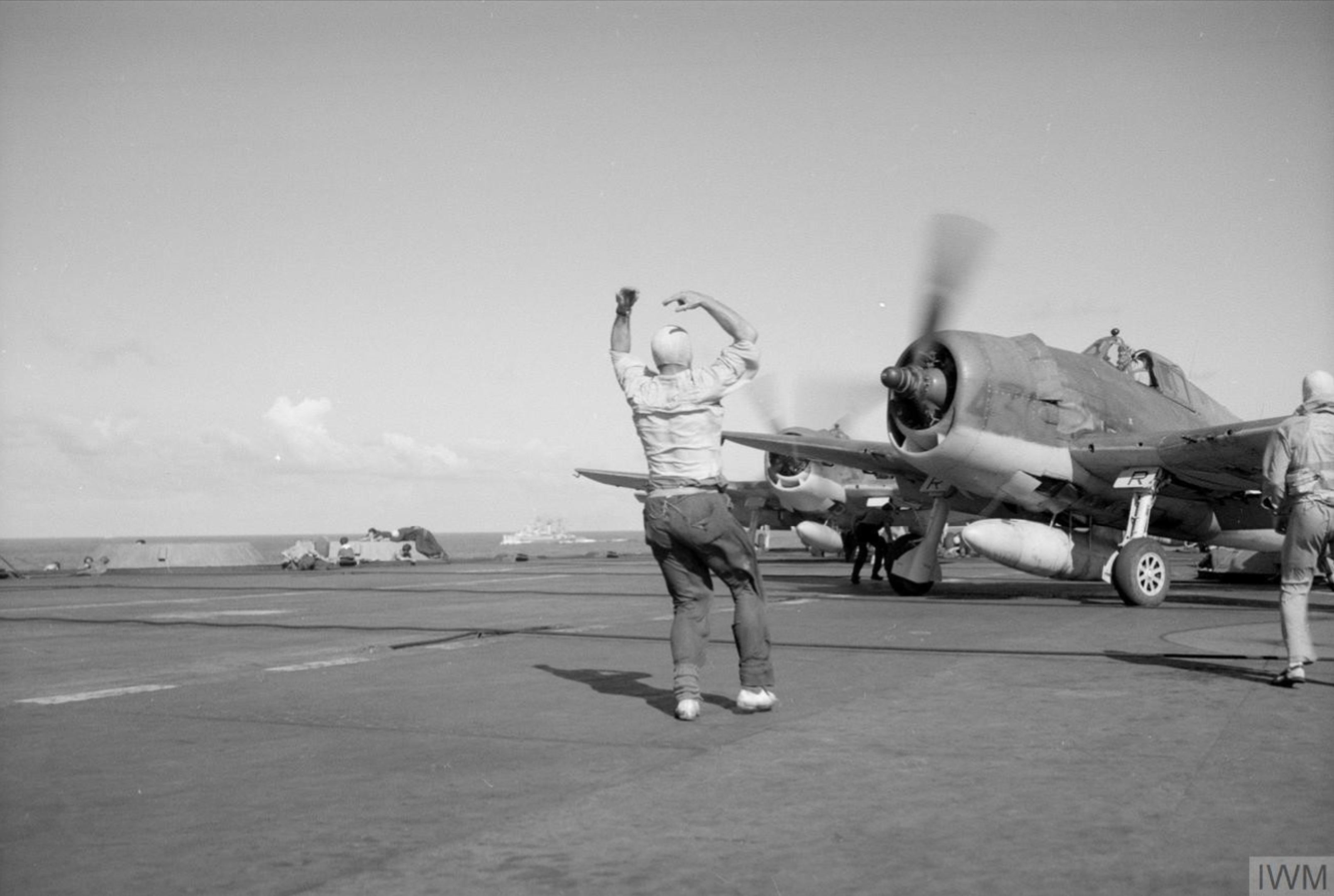 HMS Indomitable launches Hellcat FAA 1839NAS for a raid on Padang Sumatra Aug 1944 IWM A25586
