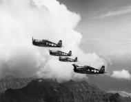 Asisbiz Grumman F6F 3 Hellcat VF 1 White K0, K7, K9 and K4 in formation CV 10 USS Yorktown II June 1944 02
