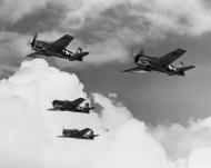 Asisbiz Grumman F6F 3 Hellcat VF 1 White K0, K7, K9 and K4 in formation CV 10 USS Yorktown II June 1944 03