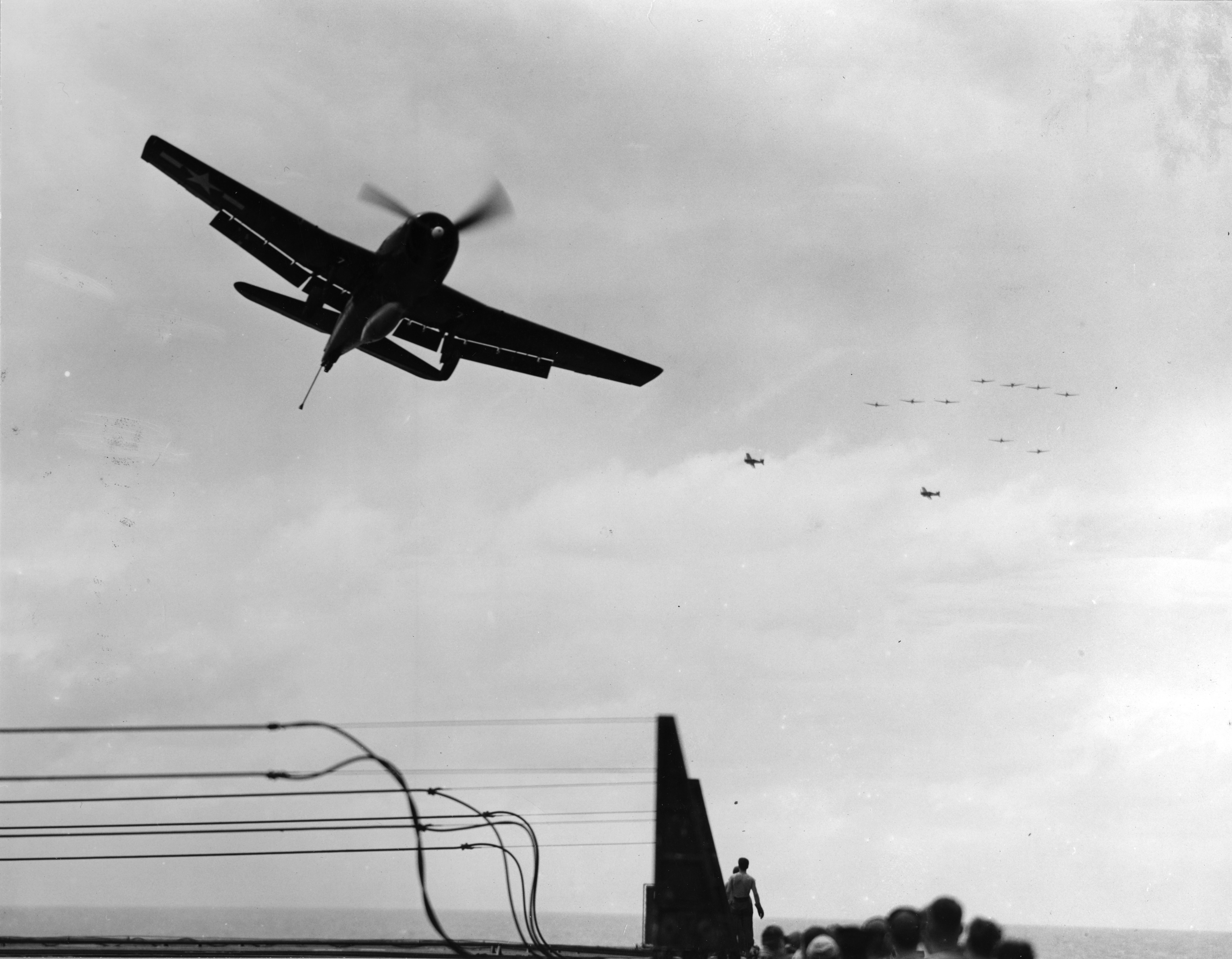 Grumman F6F 5 Hellcat VF 11 Sundowners being waved off CV 12 USS Hornet 1945 01
