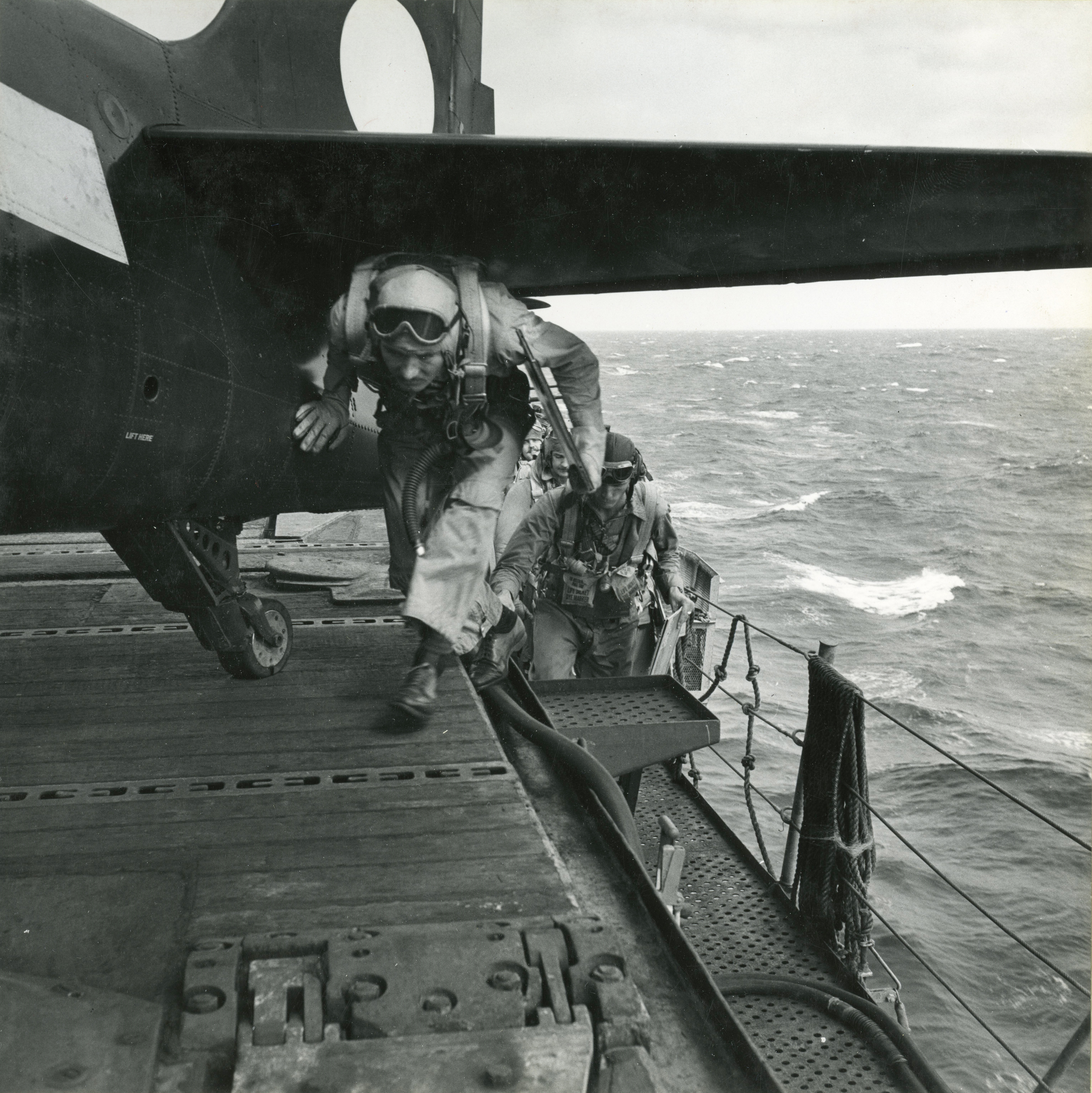 Grumman F6F 5 Hellcat VF 11 Sundowners pilots walking to their aircraft CV 12 USS Hornet Nov 1944 02