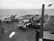 Asisbiz Grumman F6F 5 Hellcat VF 12 White 32 and 74 ready for catapult launch CV 15 USS Randolp 01