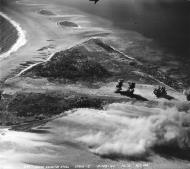 Asisbiz Strike photograph taken over Engebi Eniwetok Atoll by a Hellcat from VF 12 01