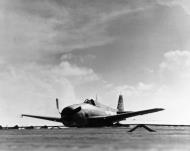 Asisbiz USS Essex (CV 9) F6F Hellcat VF 15 White 23 damaged over Wake Lt JJ Collins belly landing 23rd May 1944 01