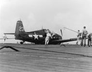 Asisbiz USS Essex (CV 9) F6F Hellcat VF 15 White 23 damaged over Wake Lt JJ Collins belly landing 23rd May 1944 80 G 373617 BW