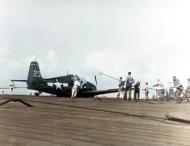 Asisbiz USS Essex (CV 9) F6F Hellcat VF 15 White 23 damaged over Wake Lt JJ Collins belly landing 23rd May 1944 80 G 373617