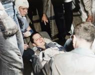 Asisbiz USS Essex (CV 9) F6F Hellcat VF 15 damaged over Wake pilot Lt JJ Collins on a stretcher after crash landing 23rd May 1944 80 G 373619