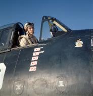 Asisbiz Aircrew USN LTJG Eugene R Hanes in the cockpit of F6F on USS Lexington CV 16 80 GK 15562
