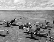 Asisbiz Grumman F6F 3 Hellcat VF 16 White 4 and 18 ready for launch CV 16 USS Lexington 16th Apr 1944 01