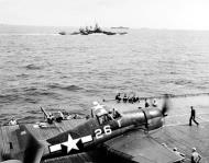 Asisbiz USS Lexington II (CV 16) Grumman F6F 3 Hellcat VF 16 is ready for launch during Marianas air strikes by TF 58 13th June 1944 80 G 236892
