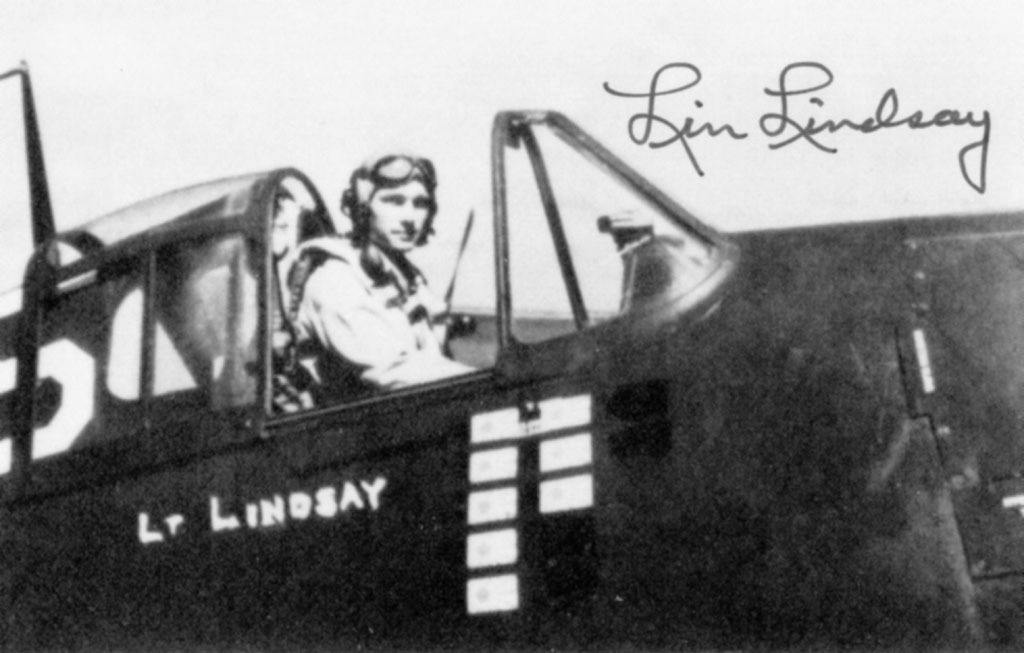 Aircrew USN VF 19 Lt Cdr Elvin Lindsay in the cockpit of his F6F