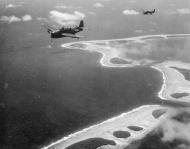 Asisbiz Grumman TBM 1C Avenger VT 2 Torpedo Squadron Two White 97 during a strike on Woleai USS Hornet CV 12
