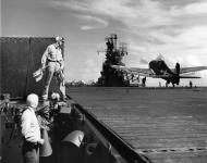 Asisbiz Grumman F6F 5 Hellcat VF 20 White 16 landing aboard CV 16 USS Lexington 01