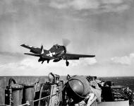 Asisbiz Grumman F6F 5 Hellcat VF 20 White 4 taking off from CV 16 USS Lexington 25th Jan 1945 01