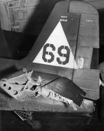 Asisbiz Grumman F6F 5 Hellcat VF 20 White 69 BuNo 58468 showing flak damage CV 16 USS Lexington 01