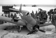Asisbiz Grumman F6F 5 Hellcat VF 33 White 6 taxing mishap at Barakoma airstrip Solomon Islands 01