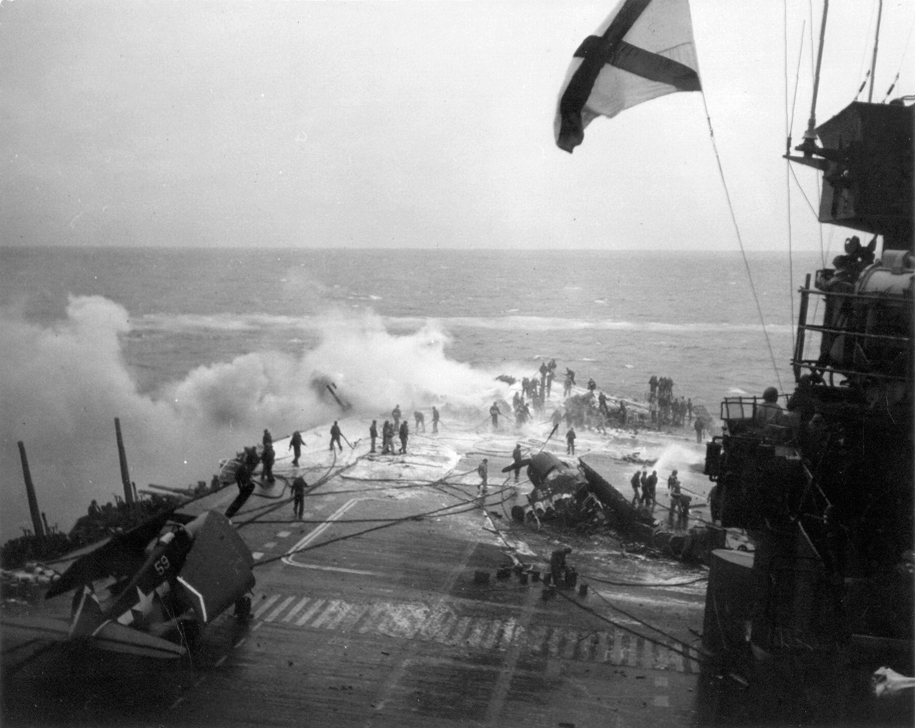 Grumman F6F 5 Hellcat VF 53 White 59 during kamikaze attack CV 3 USS Saratoga 21st Feb 1945 02