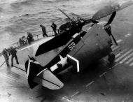 Asisbiz Grumman F6F 5 Hellcat VF 53 White 59 during kamikaze attack CV 3 USS Saratoga 21st Feb 1945 01