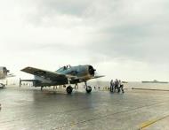 Asisbiz Grumman F6F 3 Hellcat VF 9 White 12 preparing for launch CV 9 USS Essex Truk raids 17 18th Feb 1944 ASC1