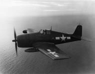 Asisbiz Grumman F6F 5N Hellcat aircraft of VMFN 533 F(N)16 in flight near Ie Shima Okinawa 1945