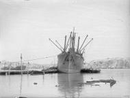 Asisbiz Merchant ship Orari freight being emptied in Grand Harbour Malta 16th Jun 1942 IWM A10416