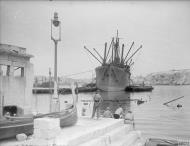 Asisbiz Merchant ship Orari freight being emptied in Grand Harbour Malta 16th Jun 1942 IWM A10418