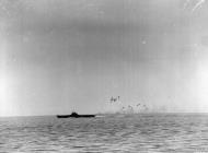 Asisbiz Operation Pedestal aircraft carrier firing at a dive bomber Aug 1942 IWM A11198