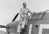 Asisbiz Aircrew RAF 242Sqn PO Norman N Campbell seated on Douglas Bader aircraft Duxford Sep 1940 IWM CH1409