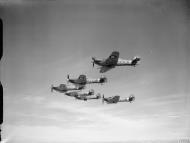 Asisbiz Hawker Hurricane IIc RAF 3Sqn QOZ, QOP, QOF, QOT, QOR and QOY in formation IWM CH3496