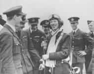 Asisbiz Aircrew RAF ace James Ginger Lacy accepts congratulations from teammates 01