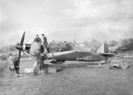 Asisbiz Hurricane I RAF 601Sqn UFK P3886 previously flown by HJ Riddle being repaired at RAF Exeter 1940 IWM C1638