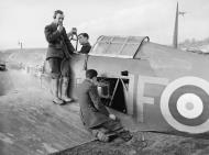 Asisbiz Hurricane Is RAF 601Sqn testing the VHF at Exeter Devon Nov 1940 IWM CH1636